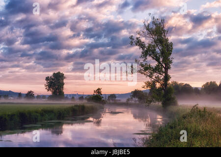 Early morning impression at the Brenz river in the Eselsburger Valley (Eselsburger Tal) near Herbrechtingen, Germany. Beauty of nature concept. Artist Stock Photo