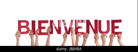 Many Hands Holding the French Word Bienvenue which means Welcome Stock Photo