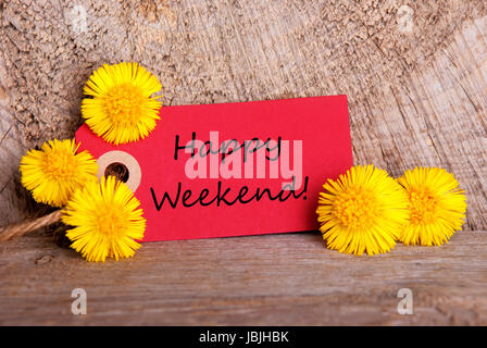 A Red Tag with the Words Happy Weekend on it and Yellow Flowers on Wood ...