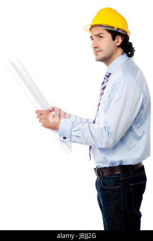 Smiling construction worker holding blueprint Stock Photo