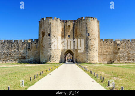 Porte des Moulins, one of the old medieval town gateways of Aigues Mortes, Gard, Occitanie, France Stock Photo