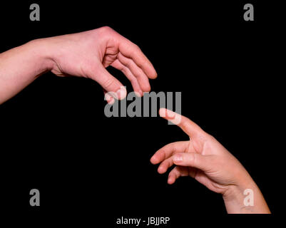 Helping hand  on black background Stock Photo
