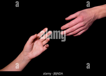 Helping hand  on black background Stock Photo