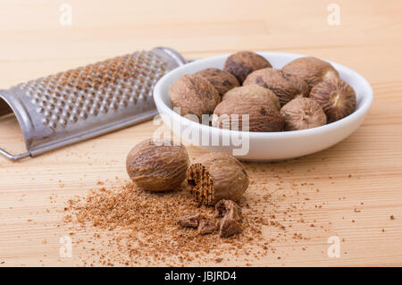 Whole and grated muscat with rasp Stock Photo