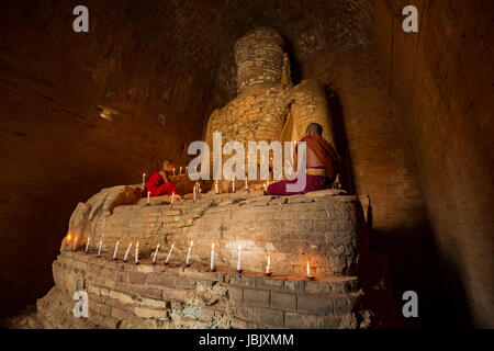 Buddhist novice monk Young-monk little-monk worship Bagan Myanmar Temple Stock Photo