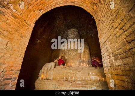 Buddhist novice monk Young-monk little-monk worship Bagan Myanmar Temple Stock Photo