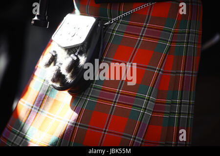 Color detail of a traditional Scottish kilt, with a bag. Stock Photo
