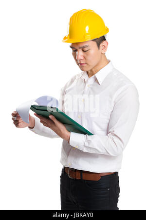 Young contractor with hardhat and clipboard Stock Photo