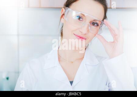 Hospital Laboratory Technician. Female Lab Worker Portrait with Safety Lab Glasses Stock Photo