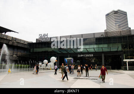 Asian thai people and foriegner travelers walking at free space between Siam Cemter and Siam Paragon shopping and entertainment area on May 16, 2017 i Stock Photo