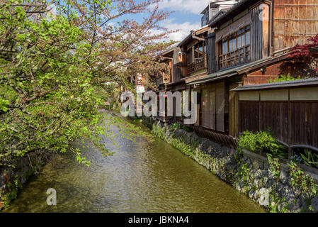 Shirakawa river runs behind many of the traditional old buildings, most are teahouses or restaurants. Stock Photo