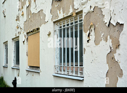 dilapidated facade of an abandoned company in magdeburg Stock Photo