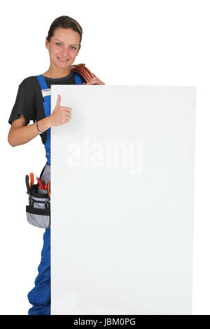 Woman with blank board, toolbox and thumbs up Stock Photo