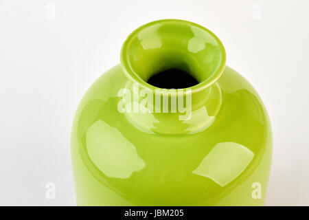 Green ceramic empty vase isolated. Stock Photo