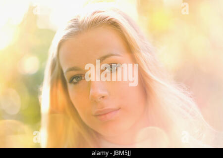 Portrait serious beautiful teenage blonde girl Stock Photo