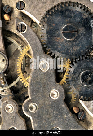 Extreme close up of the inside workings of a jeweled pocket watch time piece Stock Photo