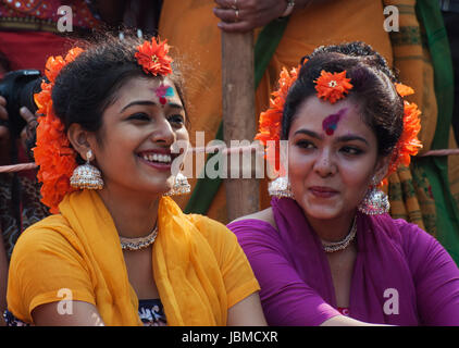 KOLKATA , INDIA - MARCH 16, 2014 : Girl dance performers enjoying themselves before dancing starts. Spring festival is one of the popular festivals in India , known as Dol (in Bengali) or Holi (in Hindi) celebrating arrival of Spring in India. Stock Photo