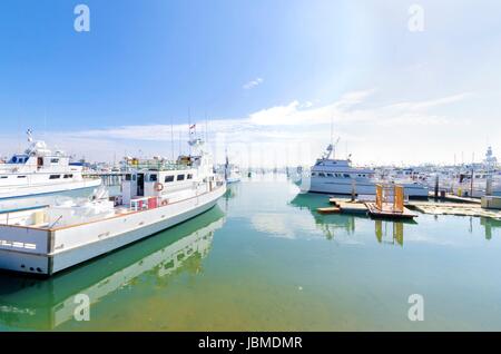 The Shelter island Marina in Point Loma, San Diego, Southern California, United States of America. A view of the yachts and boats docked on the harbor. Stock Photo