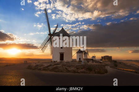 Windmills at sunset, Consuegra, Castile-La Mancha, Spain Stock Photo