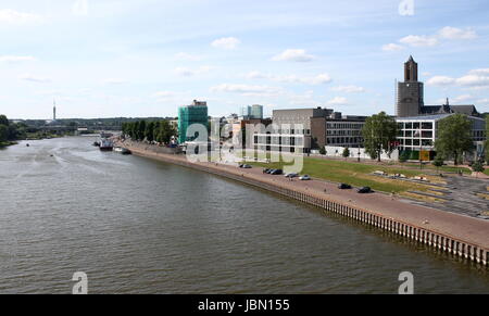Skyline of inner city of Arnhem, Netherlands with Eusebius Church or Grote Kerk. Northern river bank of the Lower Rhine. Taken from John Frost Bridge. Stock Photo