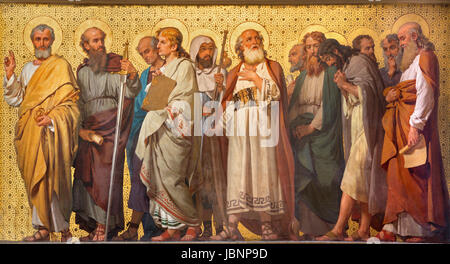 TURIN, ITALY - MARCH 15, 2017: The symbolic fresco of Twelve apostles  in church Chiesa di San Dalmazzo by Enrico Reffo (1914). Stock Photo
