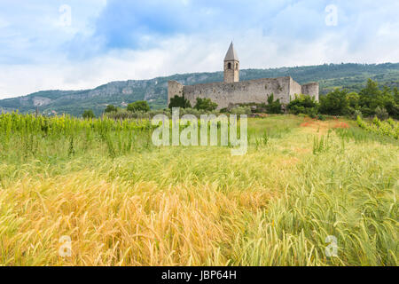 Church of the Holy Trinity, which contains famos late-medieval Danse Macabre fresco. Slovenia, Europe. Stock Photo