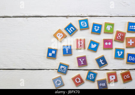 QUEENSTOWN, SOUTH AFRICA - 09 APRIL 2017: Social Media logotype popular collection printed and place on wood scrabble game pieces isolated on white wo Stock Photo
