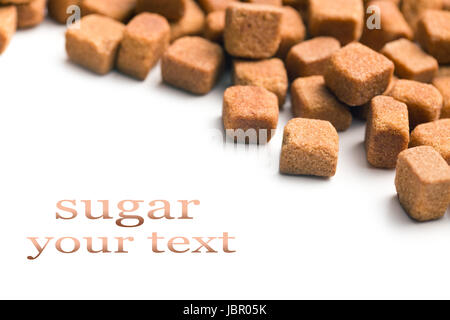 brown sugar cubes on white background Stock Photo