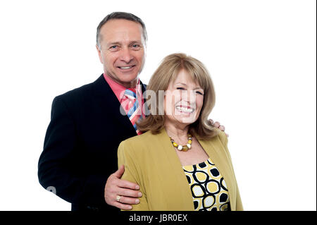 Beautiful loving couple smiling isolated over a white Stock Photo