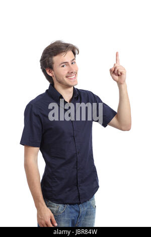 Happy presenter man pointing up and looking at camera isolated on a white background Stock Photo