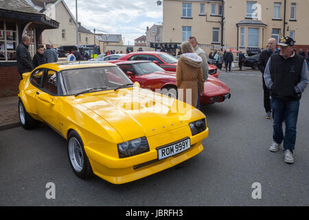 1982 80s Yellow Ford Capri Ghia Auto 7669 cc ; Cleveleys, UK.June, 2017. The Cleveleys Car Show is a yearly event which is staged along Victoria Road West and the Sea front Promenade in Cleveleys Town Centre. Stock Photo