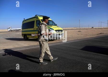 Al-Minja, Egypt. 26th May, 2017. An Egyptian soldier guards a checkpoint near Al-Minja, Egypt, 26 May 2017, At least 26 Coptic Christians travelling in a bus to a cloister were killed when unknown assailants opened fire. Another 25 passengers were injured, according to the health ministry spokesman in Cairo. The motive of the attackers remains unknown at this point. Photo: -/dpa/Alamy Live News Stock Photo