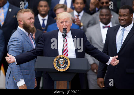Washington, DC, USA. 12th June, 2017. U.S. President Donald Trump speaks during a ceremony honoring the 2016 NCAA Football National Champions Clemson University Tigers at the White House in Washington, DC, the United States, on June 12, 2017. Credit: Ting Shen/Xinhua/Alamy Live News Stock Photo