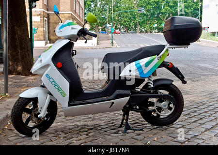 Ecooltra electric scooter sharing parked perpendicularly. Environment, e-mobility, emission-free, eco-friendly, global warming, climate change.   Rome Stock Photo