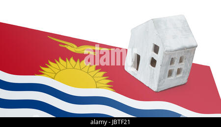 Small house on a flag - Living or migrating to Kiribati Stock Photo