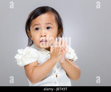 Baby girl clap hand Stock Photo