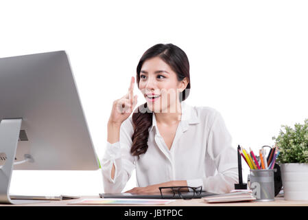 Beautiful graphic designer using graphics tablet to do her work at desk Stock Photo