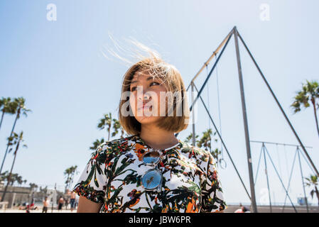 Young woman gazing from Venice Beach, California, USA Stock Photo