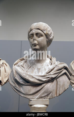 Marble portrait bust of a woman. Culture: Roman. Dimensions: 29 3/4 in. ×  19 1/2 in. × 10 in. (75.6 × 49.5 × 25.4 cm). Date: ca. A.D. 155-165. This  woman wears