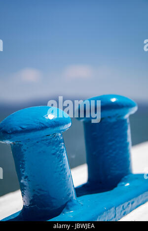 Blue mooring cleats on a boat closeup depth of field Stock Photo