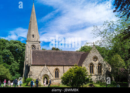 A wedding party outside Holy Innocents Church, High Beach, Epping Forest, Essex, England Stock Photo