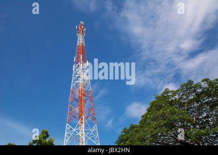 telecommunication mast TV antennas wireless technology under blue sky with cloud Stock Photo