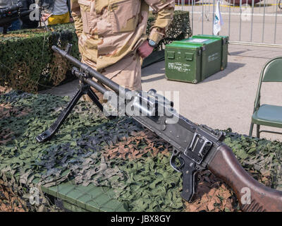 ALMERE, NETHERLANDS - 12 APRIL 2014: Assault rifle as used by the Dutch military on display during the first National Security Day held in the city of Almere Stock Photo