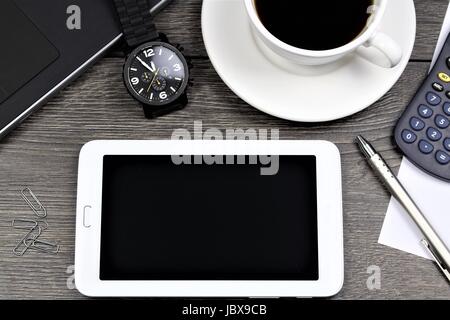 word help on notebook, Office desk with electronic devices, computer and paper, wood table from above, concept image for blog title or header image. Stock Photo