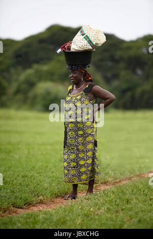 Portrait of an african lady wearing things on her head Stock Photo