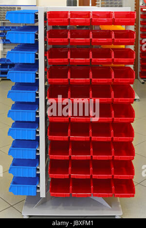 Storage organizer cart with plastic sorting bins Stock Photo