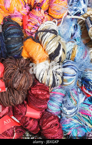 BOUCKVILLE, NY, USA - JUNE 10 2017: Merino and other types of wool skeins for sale at the annual Fiber Festival of Central New York. Stock Photo