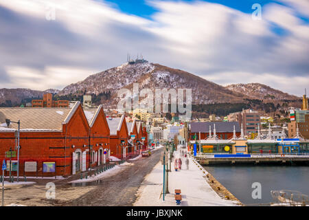 Hakodate, Japan cityscape at the historic Red Brick Warehouses and Mt. Hakodate. Stock Photo