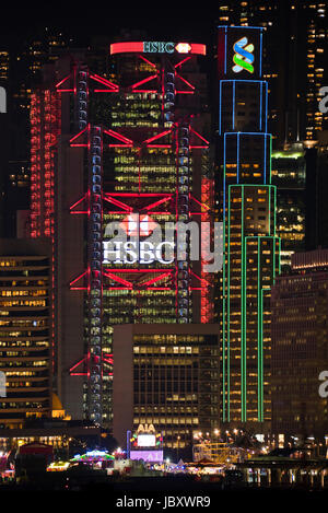 Vertical view of iconic skyscrapers illuminated at night in Hong Kong, China. Stock Photo