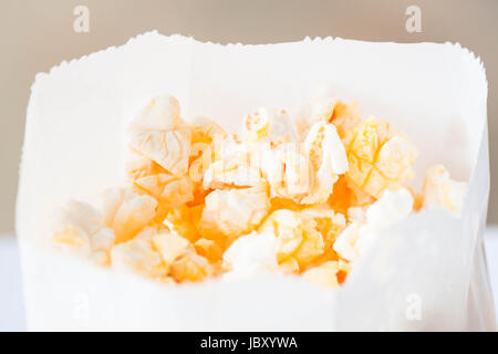 Fresh classic butter popcorn in paper pack Stock Photo